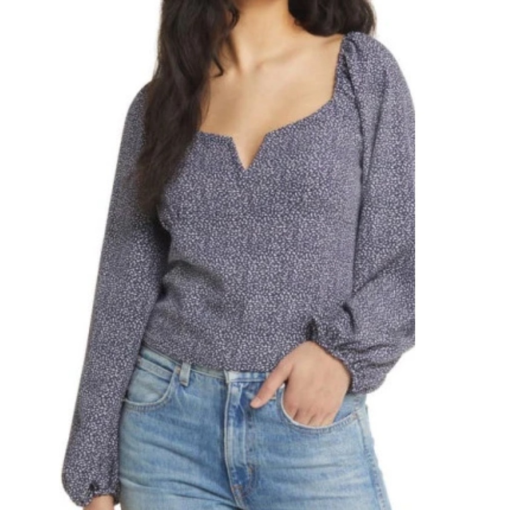 women's blouse, featuring long sleeves and a square neckline and small V cut.